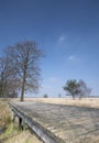 Landscape scene blue sky, bridge in foreground, color in nature, wide angle lens shot Royalty Free Stock Photo