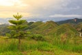 Landscape scene of Sunrise with beautiful green hills view from Dream World Resort, Kundasang, Sabah, Borneo