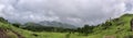 A landscape sceneic veiw of meadow on mountain range. Panorama. Ponmudi, Kerala, India