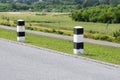 Landscape Scenic road travel on empty highway and concrete traffics pole with sky and clouds Royalty Free Stock Photo