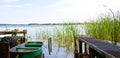 Landscape of the Schaalsee with jetty and rowing boat, Germany
