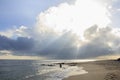 Landscape of sea, beach and cloudy sky which has sun beam Royalty Free Stock Photo