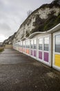 Landscape by the sea. Row of beach huts in Eastbourne East Sussex England UK Royalty Free Stock Photo