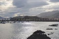 Landscape from the sea of town in Basque country, Spain. Picturesque seascape with mountains and boats in bay. Royalty Free Stock Photo