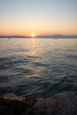 Landscape in the sunset, view of the sea in Baska Bay. seascape waves and beach Royalty Free Stock Photo