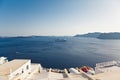 A landscape with sea view. Cruise liner at the sea near the island Santorini, Greece Royalty Free Stock Photo