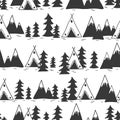 Seamless pattern with fir trees, mountains, wigwams Royalty Free Stock Photo