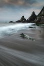 Landscape seascape of jagged and rugged rocks on coastline with