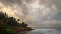 Landscape of the seashores of Goa with sky, clouds and palm trees during monsoon Royalty Free Stock Photo