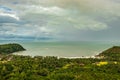 Landscape serene view with sea horizon and dense green forests