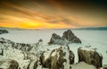 Shamanka rock at sunset,Lake Baikal, Siberia, Russia. Royalty Free Stock Photo