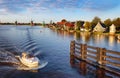 Landscape with ship and watermills in Netherlands Royalty Free Stock Photo