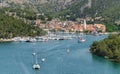 Landscape of ships and boats on a river surrounded by the Old Town of Skradin, Croatia Royalty Free Stock Photo