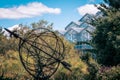 Landscape shot of the greenhouse and statue in the gardens during the summer in Grand Rapids Michigan