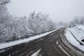 Landscape shot of the Italian Apennines road covered in snow in Vezzolacca, Italy Royalty Free Stock Photo