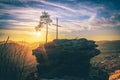 Four castles view, RÃÂ¶tzenfels, a sandstone rock with a cross and a tree. Sunrise, fog, Palatinate Forest, Germany. landscape shot Royalty Free Stock Photo