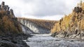 Landscape with the Siberian river in a rocky gorge in autumn