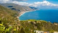 Landscape of Sicialian coast near Taormina town, Sicily, Italy. Mountains and azure waters of Ionian sea. Popular resort Royalty Free Stock Photo