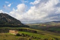 Landscape of Sicily and ancient greek temple in Segesta archaeological area, Italy. Royalty Free Stock Photo