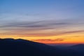 Landscape of the silhouettes of hills in the Pasiegos Valleys during the sunset in Spain Royalty Free Stock Photo