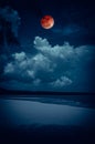 Landscape of sky with bloodmoon on seascape to night. Serenity n Royalty Free Stock Photo