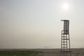 Landscape of sky and sea which has lifeguard chair on beach Royalty Free Stock Photo