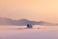 Landscape in Slovenia, nature in Europe. Church island in the morning fog, travel in Slovenia. Beautiful sunrise with blue sky,