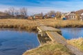 Landscape with small simple pedestrian bridge