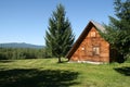 Countryside landscape with a lovely wood house Royalty Free Stock Photo