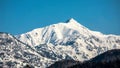 Landscape of the snow mountain with blue sky at Japan Alps Mountain. Winter season concept Royalty Free Stock Photo