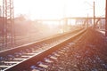 Landscape of a snowy Russian winter railway under bright sunlight The rails and sleepers under the December snow. Russian Railway