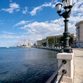 Panorama of the Italian city of Bari, promenade, lights, observation wheel, spring. Traveling in Italy, tourism