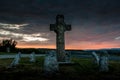 Landscape standing stones and cross at sunrise saint lucie ,lozere , france