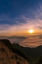 Landscape of the mountain and sea of mist in winter sunrise view from top of Doi Pha Tang mountain , Chiang Rai, Royalty Free Stock Photo