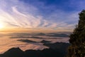 Landscape of the mountain and sea of mist in winter sunrise view from top of Doi Pha Tang mountain , Chiang Rai, Royalty Free Stock Photo