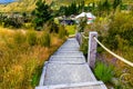 Landscape with steps wedding tent , at Dublin Bay with backdrop of the Southern Alps , in Wanaka, Otago, South Island, New Zealand Royalty Free Stock Photo