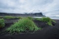 Landscape in the Stokksnes, Iceland. Black sand on the sea shore and high rocks. Natural landscape in the Iceland. Royalty Free Stock Photo