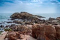 Landscape stones line up the blue sea