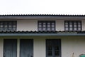 Landscape of 2 storey wooden house, Asian style, old wooden house for rent. Royalty Free Stock Photo