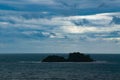 Landscape with storm clouds, sea and tropical island on horizon. Koh Chang, Thailand Royalty Free Stock Photo