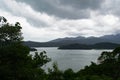 Landscape with storm clouds, sea and tropical island on horizon. Koh Chang, Thailand Royalty Free Stock Photo