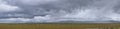 Landscape stormy panorama view from the border of Utah and Idaho from Interstate 84, I-84, view of rural farming with sheep and co