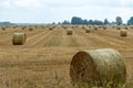 Landscape with straw rolls on a fallow field, late summer in nature