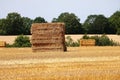 Landscape with a stubble field with straw bales Royalty Free Stock Photo