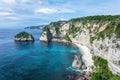 Landscape of sunny day with turquoise ocean, blue sky and mountains. View of Diamond beach, Nusa Penida, Bali island, Indonesia.