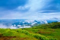 Landscape of sunrise on Green mountains and beautiful sky clouds under the blue sky, Dramatic moving cloud in nature landscape,