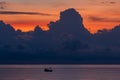 Landscape sunrise on the island of Phu Quoc, Vietnam. Morning sky, storm clouds, fishing boat and sea water Royalty Free Stock Photo