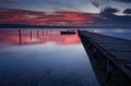 Landscape during sunset. Beautiful natural seascape, blue hour. Winter sunset at a lake coast near Varna, Bulgaria. Royalty Free Stock Photo