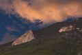 Landscape, sunset in the mountains, pink cumulus clouds over the top of the mountain. selective focus Royalty Free Stock Photo