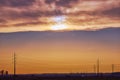 sunset over a high voltage line Royalty Free Stock Photo